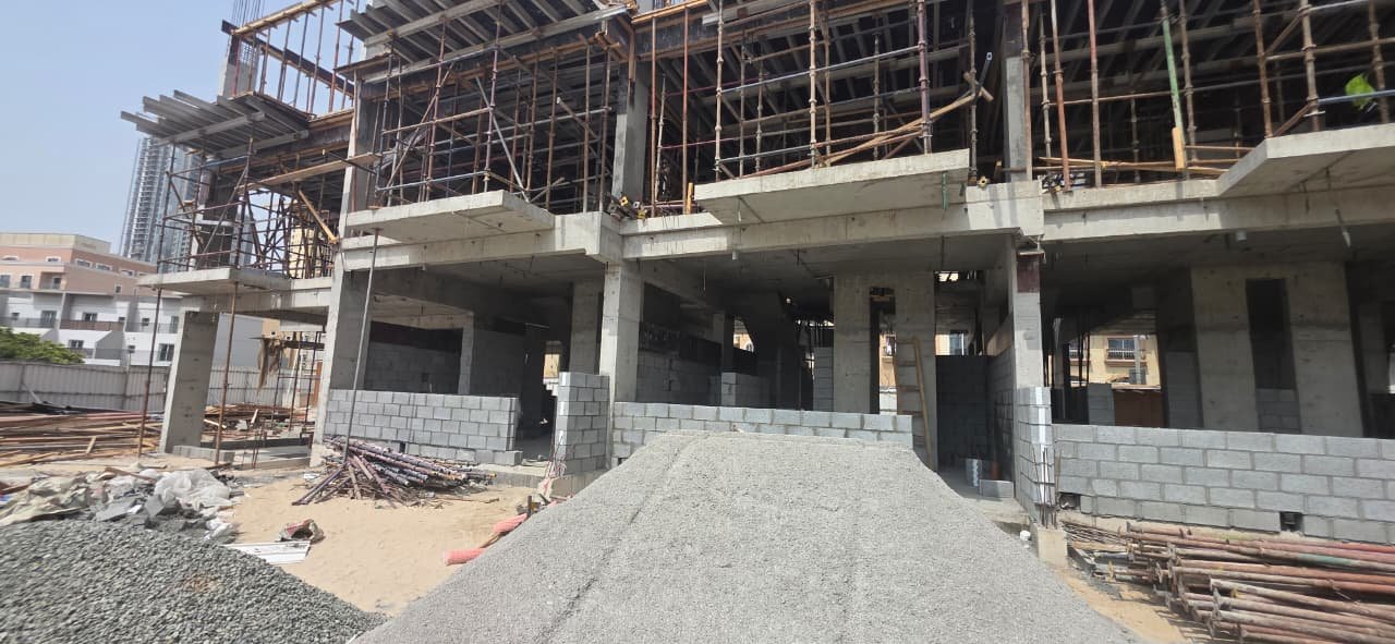 Structural concrete frame and blockwork under construction at The Promise Villas, Jumeirah Village Circle